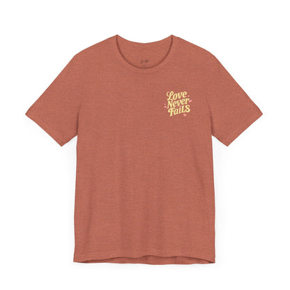 Love Never Fails Vintage T-Shirt